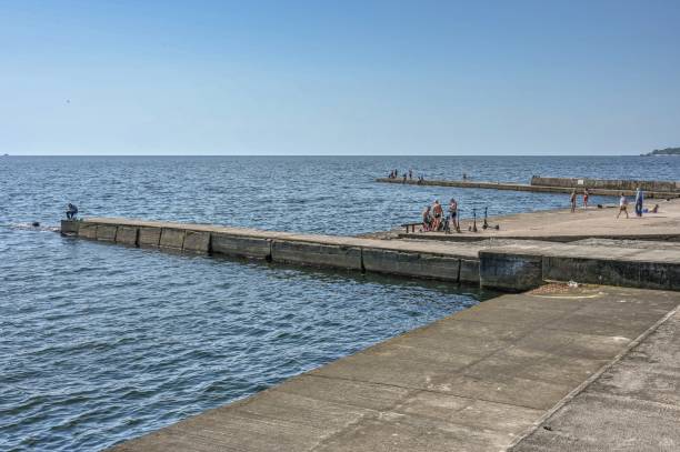 Embankment of the Lanzheron beach in Odessa, Ukraine Odessa, Ukraine 14.06.2023. Embankment of the Lanzheron beach in Odessa, Ukraine, on a sunny summer morning odessa beach stock pictures, royalty-free photos & images
