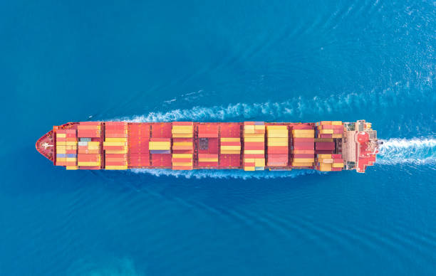 istock Top viewContainer ship loading and unloading in sea port, Aerial view of business logistic import and export freight transportation by container ship in harbor, Container loading Cargo freight ship, Dubai 1498328661