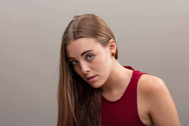 istock Unsure woman in red top 1498328700