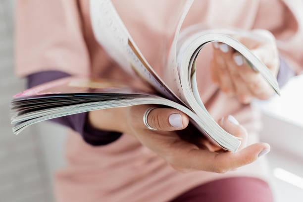 istock woman reading a magazine 1498328727