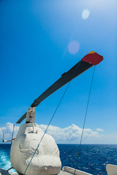 transportation of a helicopter on a yacht across the ocean. - repairing sky luxury boat deck imagens e fotografias de stock