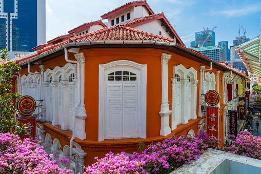 Modern orange colored house or building of the Singapore city.