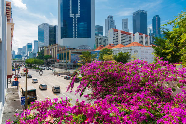 Singapore city road with crowd of transportation on road, concept of busy city street.