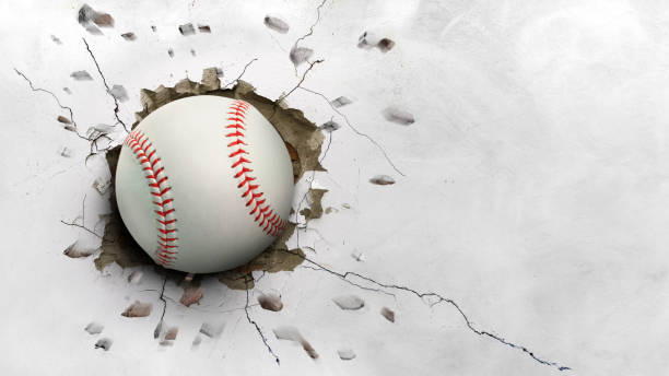 istock A baseball hits through a cement wall. concept of strength 1498332467