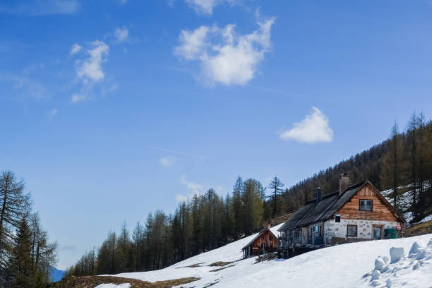 Wonderful winter hiking trails and traces on the fresh alpine snow cover of the Swiss Alps and UNESCO Biosphere Entlebuch, Switzerland - Herrliche Winterwanderwege und Spuren auf der frischen Schneedecke