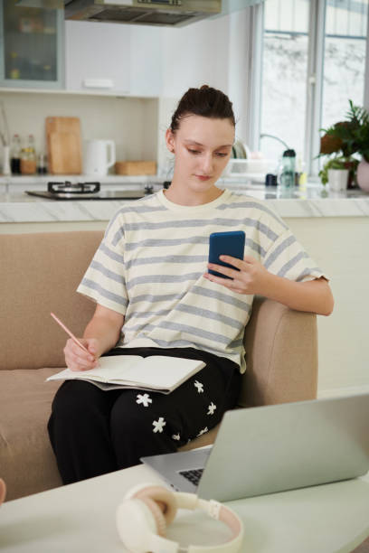 istock Woman planning her work at home 1498335554