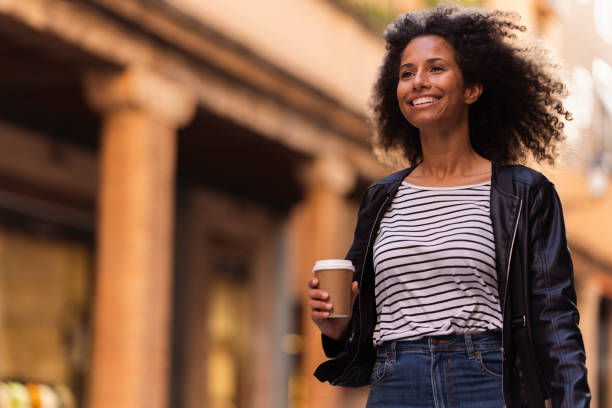 istock Millennial commuter on her way to work outdoors in the city 1498336836