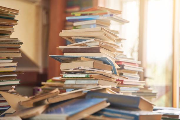 pile of old books on the table