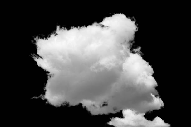 istock white fluffy clouds standing out against a black background and a blue sky 1498337057