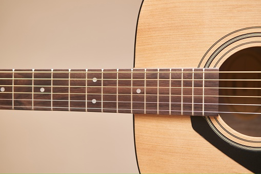 Acoustic guitar. Musical instrument. Close-up.