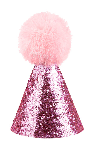 Pink birthday party hat isolated on white background.