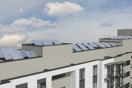 Apartment Buildings With Solar Panels On The Roofs
