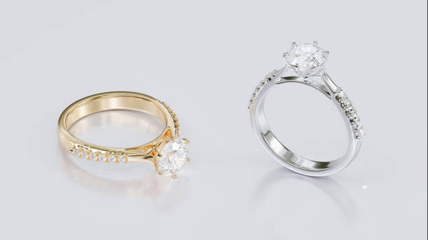 istock 3d render Gold and white gold ring set with diamonds. 3D design in studio lighting with jewelry shop atmosphere concept. 1498348610
