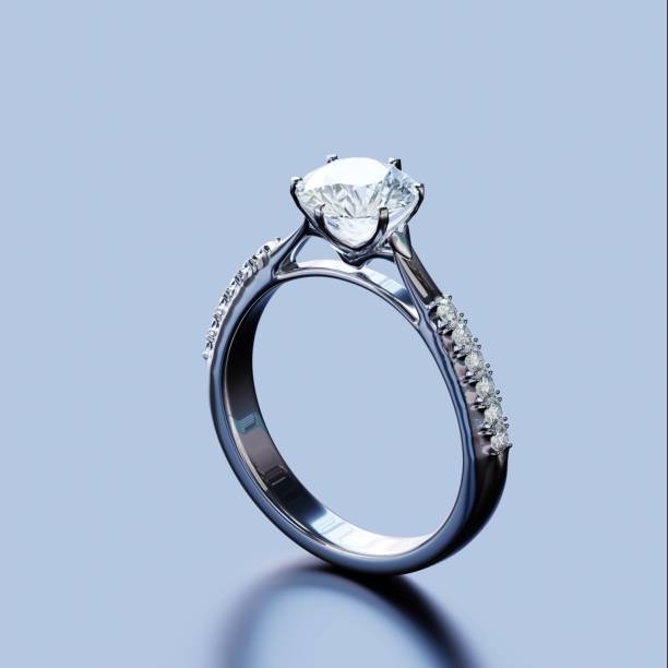 istock 3D render platinum diamond ring design in studio lights, atmospheric concept in a jewelry store. 1498348644