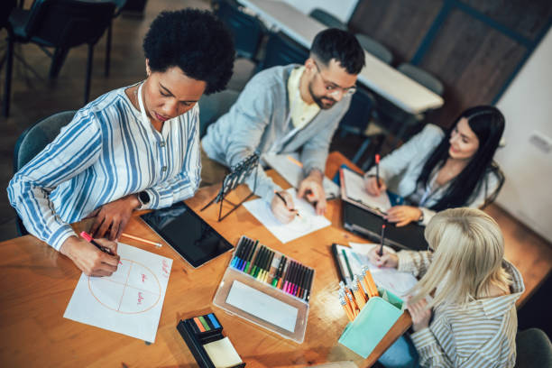 istock Business people on meeting in modern office. Brainstorming 1498351719