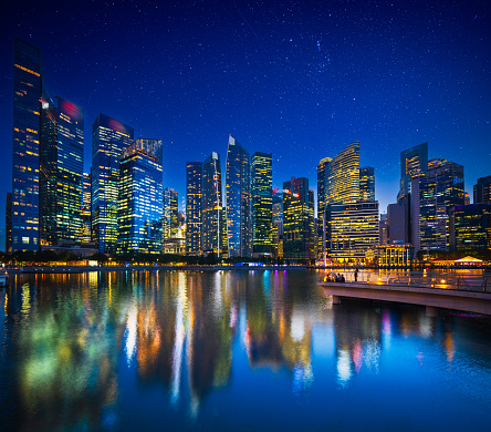 Beautiful reflection of Singapore Financial district at night.