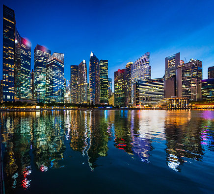 Beautiful reflection of Singapore Financial district at night.