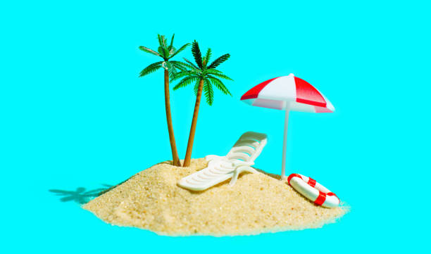 istock Sandy Beach Island with Miniature Toy Palm Trees 1498357236