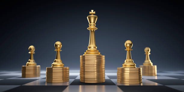 istock Golden Chess Pieces on Chess Board 1498359138