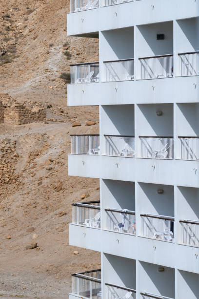 Rooftop Retreat: Hanging Clothes on Balcony of a Hotel