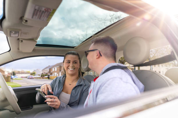 istock Working Out Directions in The Car with my Brother 1498368634