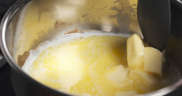istock melting butter in pot close up photo 1498371497