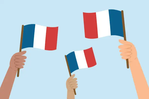Vector illustration of Diverse people hands raising flags of France. Vector illustration of French flags.