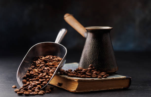 Aromatic roasted coffee beans Aromatic roasted coffee beans, a perfect morning brew. Turkish coffee turkish coffee pot cezve stock pictures, royalty-free photos & images