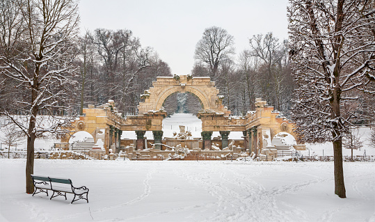 Vienna -  Ruins in gardens of Schonbrunn palace in winter. Building was designed by the architect Johann Ferdinand Hetzendorf von Hohenberg.