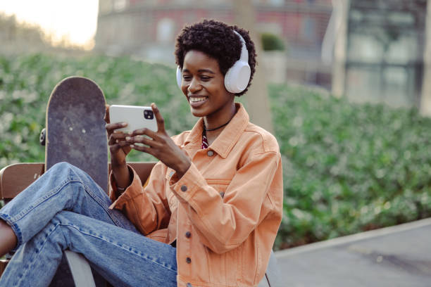 istock African American woman having fun watching online content 1498390667