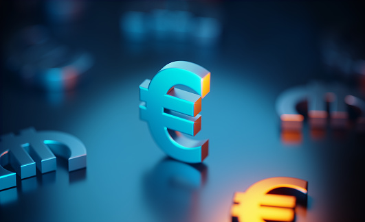 Metallic Euro symbols on blue reflective surface. Horizontal composition with copy space.