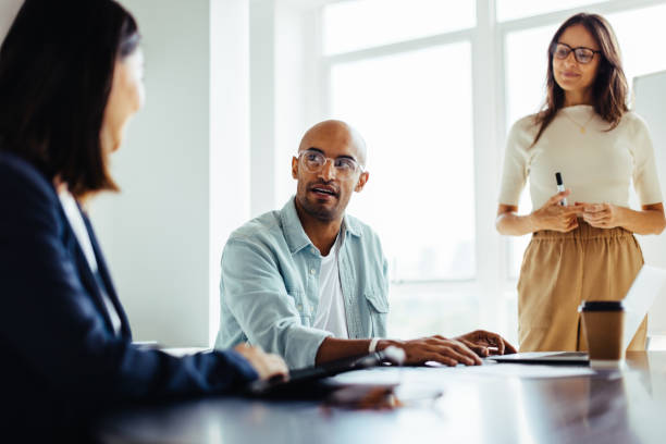 istock Business people having a discussion in a meeting 1498394875