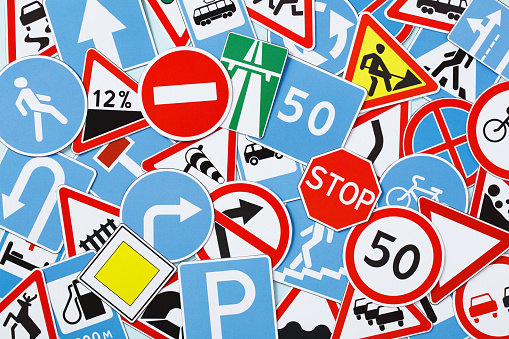 Road signs and traffic symbols top view.