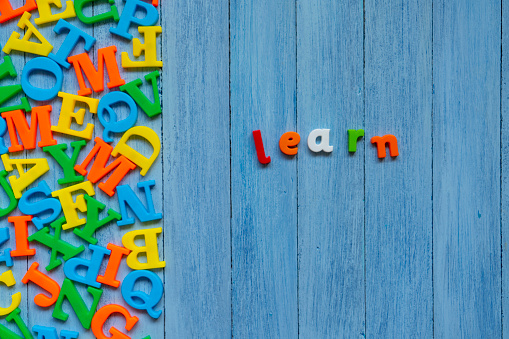 Colorful Learn word on wooden