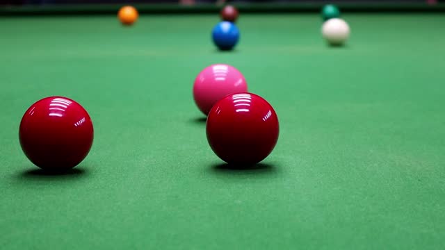 Stab a red snooker ball to start the game
