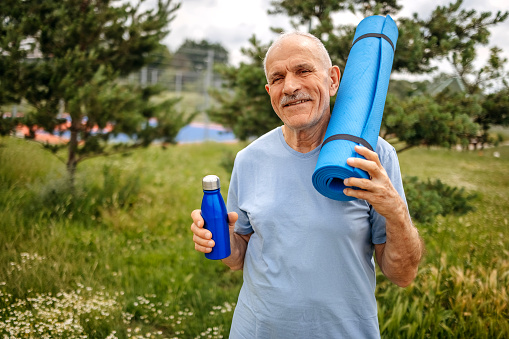 Old people living healthy lifestyle and prepared for outdoors exercise
