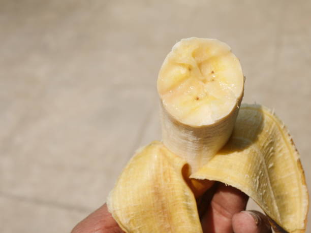 istock Banana isolated on brown background. 1498422574