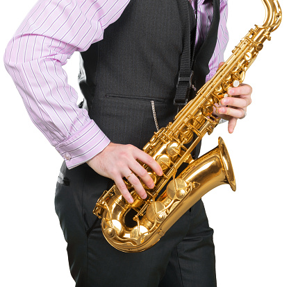 Closeup of an alto saxophone.