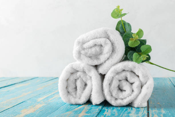 istock Beautiful spa composition on wooden table with flowers 1498425561