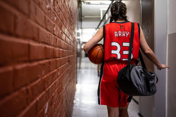 istock Female basketball player walking through aisle 1498429201