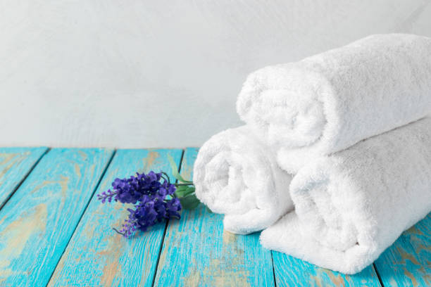istock Beautiful spa composition on wooden table with flowers 1498429383