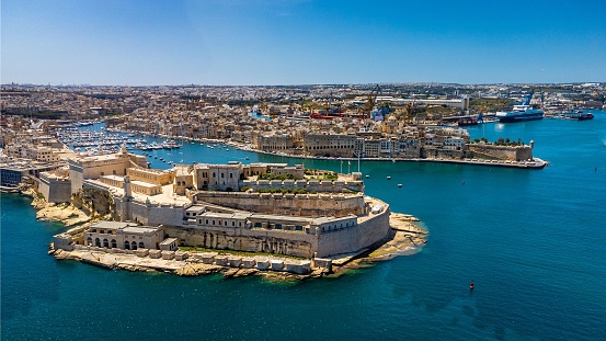 A landscape of Senglea surrounded by the sea in Birgu, Malta