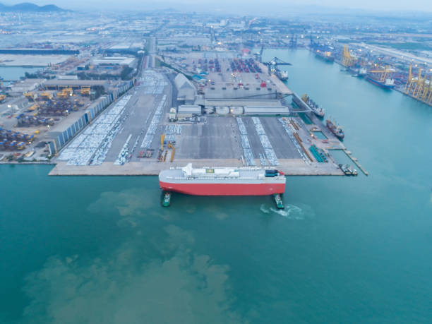istock Container ship commercial vessel alongside in port for loading and discharging containers services in maritime transports in World wide logistics 1498439703