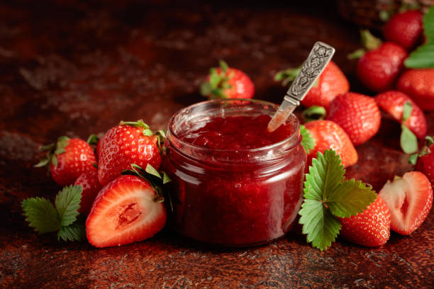 Strawberry jam and fresh berries. stock photo