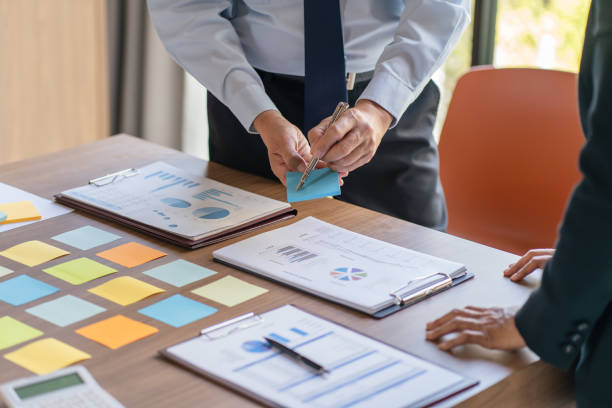 istock Business People brainstorming Meeting Design Ideas use post it notes to share idea professional investor start up project business brainstorming planning in office 1498444771