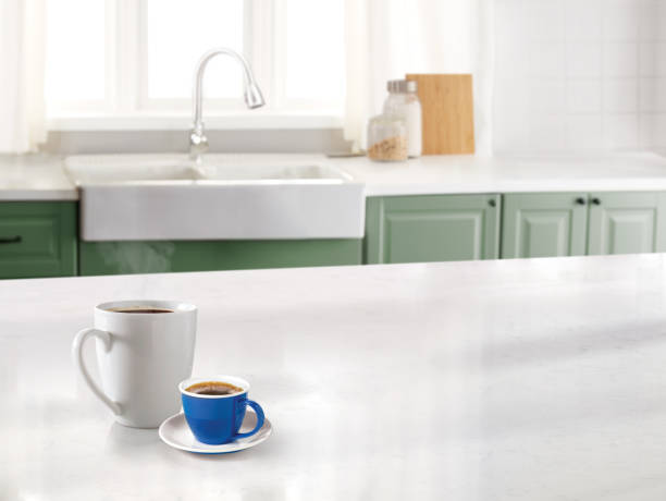 istock Coffee mug and an espresso cup in a kitchen with a marble counter 1498448272