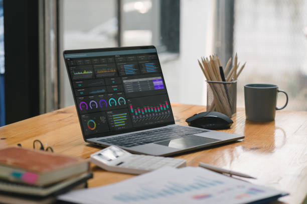 istock Business data analysis software on a dashboard screen. The investment application displays business sales and profits on the computer screen, providing advice for marketing planning decisions. 1498449214