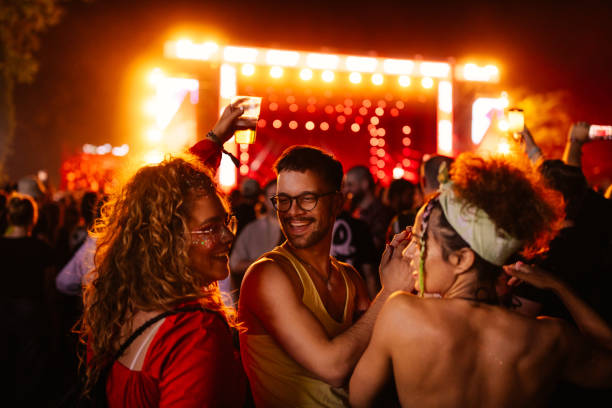 istock Exhilarated people at concert 1498452711