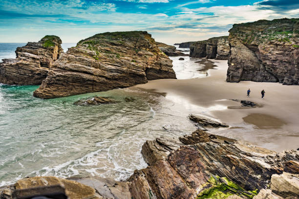 istock People walking on Beach Cathedrals Beach, Galicia Spain. 1498453151