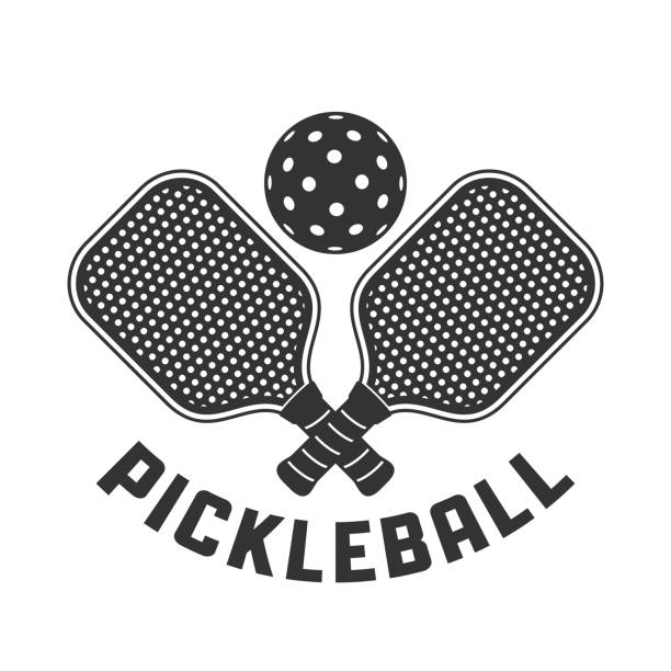 ilustraciones, imágenes clip art, dibujos animados e iconos de stock de logotipo de pickleball con raqueta cruzada y pelota encima de ellos - racket sport